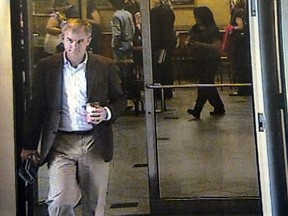 Dennis Oland on July 6, 2011 (a day before his father was found dead in his office), wearing a brown jacket.