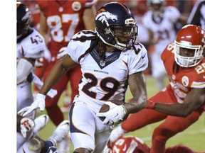 Denver Broncos cornerback Bradley Roby runs for a touchdown after recovering a fumble by Chiefs running back Jamaal Charles on Thursday night in Kansas City. The Broncos won 31-24.