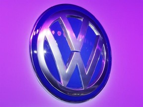 The VW Logo is fixed on a wall at the Car Show in Frankfurt, Germany, Tuesday, Sept. 22, 2015.