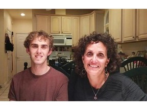 This Friday, Sept. 18, 2015 photo shows Terri Gifford, right, 56, and her son Brian Gifford, 23, at her and her husband Peter Gifford's home in New Rochelle, N.Y. Brian Gifford has lived at home with his parents for the past two years, since graduating college. (Peter Gifford/Terri Gifford via AP)