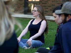 University of Windsor professor Dusty Johnstone, centre, holds her Practicum in Social Change class outside Dillon Hall Monday, Sept. 14, 2015. (NICK BRANCACCIO/The Windsor Star)