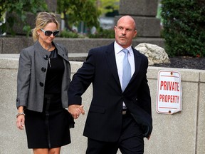 Windsor Police Const. Kent Rice and his wife arrive for his sentencing September 18, 2015. (NICK BRANCACCIO/The Windsor Star)