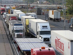 It was bumper to bumper truck traffic in the northbound lane of Huron Church Rd. as traffic was backed up south of EC Row as a delay at the Ambassador Bridge caused headaches for motorists.   (DAN JANISSE/The Windsor Star)