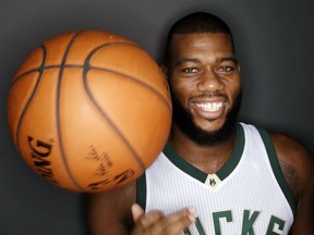 Milwaukee Bucks’ Greg Monroe poses for a picture during the team's NBA basketball media day Monday, Sept. 28, 2015, in St. Francis, Wis. (AP Photo/Morry Gash)