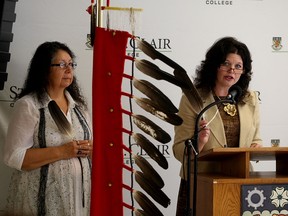St. Clair College Metis and Inuit counsellor Maxine Nahdee, left, and St. Clair College President Patricia France address an audience of several hundred during Indigenous Education Protocol signing at St. Clair College September 22, 2015. (NICK BRANCACCIO/The Windsor Star)
