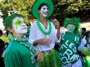 Ecole Elementaire Catholique Geroges Vanier students Jack Sinclair, left, Jared Scarlett and Nathan Brockenshire get into the spirit of Franco-Ontarian Flag Day celebrations at City Hall September 25, 2015. Every September 25th, francophones celebrate their presence in Ontario.  This year marked the 400th anniversary since french explorer Champlain travelled to regions of Georgian Bay in 1615. (NICK BRANCACCIO/The Windsor Star)