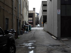 Alley between Ouellette Avenue and Pelissier Street, looking south toward Park Street following an early morning shooting Sept. 28, 2015.