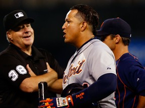 Miguel Cabrera #24 of the Detroit Tigers pleads his case to umpire Gary Cederstrom #38 after being ejected from the game during the 4th inning of the game against the Kansas City Royals at Kauffman Stadium on September 2, 2015 in Kansas City, Missouri.  (Photo by Jamie Squire/Getty Images)