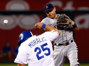 Ian Kinsler #3 of the Detroit Tigers throws toward first for a double play as Kendrys Morales #25 of the Kansas City Royals slides into second during the game at Kauffman Stadium on September 3, 2015 in Kansas City, Missouri.  (Photo by Jamie Squire/Getty Images)