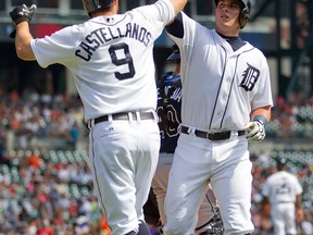 James McCann #34 of the Detroit Tigers celebrates hitting a two run home run in the bottom of the fourth inning with teammate Nick Castellanos #9 during a MLB game against the Tampa Bay Rays at Comerica Park on September 7, 2015 in Detroit, Michigan. (Photo by Dave Reginek/Getty Images)