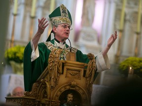 Bishop Ronald P. Fabbro presides over the 150th anniversary mass at St. Alphonsus Parish in downtown Windsor, Sunday, Sept. 6, 2015.  (DAX MELMER/The Windsor Star)