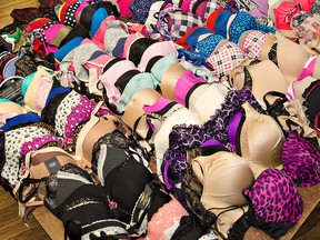A table full of women's bras at a retail store. (Postmedia News files)