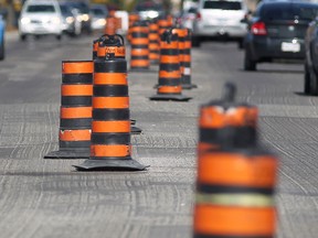 Construction barrels line a road undergoing repairs. (Windsor Star files)