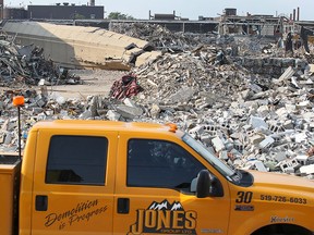 A section of the General Motors smokestack is shown after it was knocked down on Tuesday, September 1, 2015, in Windsor, ON. (DAN JANISSE/The Windsor Star)