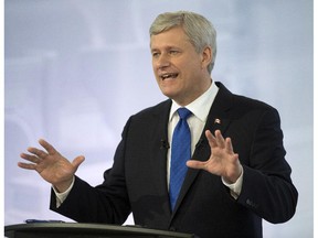 Conservative Leader Stephen Harper takes part in the French-language debate on Thursday, September 24, 2015, in Montreal.