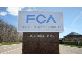 The Fiat Chrysler sign is unveiled at Chrysler World Headquarters in Auburn Hills, Mich., Tuesday, May 6, 2014.  (DAX MELMER /Windsor Star files)