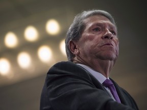 In this file photo, E. Hunter Harrison, CEO of CP Rail, speaks at the Canadian Club of Toronto in Toronto on Monday, March 3, 2015. THE CANADIAN PRESS/Darren Calabrese