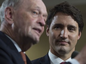 Liberal Leader Justin Trudeau and former prime minister Jean Chretien speak to the media in Hamilton, Ont., Sunday, Sept, 13, 2015.   THE CANADIAN PRESS/Jonathan