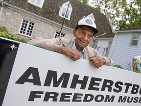 Fred Johnson, 99, a local author, is pictured in front of the Amherstburg Freedom Museum,  Saturday, Sept. 19, 2016.  The museum is celebrating it's 40th anniversary.  (DAX MELMER/The Windsor Star)