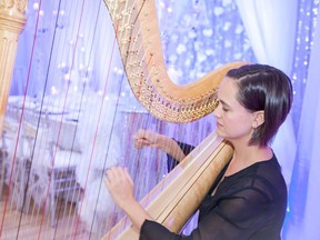 A harp player performs in front of a wedding table display at the Fall Wedding Event, set for Sept. 16-17 at the Caboto Club this year.
- Courtesy Nouveau Event Planning