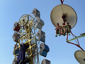 Kids going for a ride at the Harrow Fair in 2013. (Tyler Brownbridge / The Windsor Star)