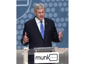 Conservative Leader Stephen Harper takes part in the Munk Debate on foreign affairs, in Toronto, on Monday, Sept. 28, 2015.