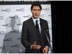 Liberal Leader Justin Trudeau fields questions after the Munk Debate on Canadian foreign policy at Roy Thomson Hall, in Toronto, on Monday, Sept. 28, 2015.