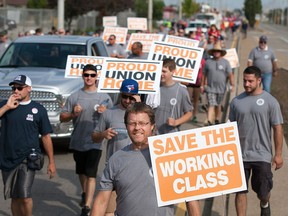 The Labour Day Parade marches down Walker Rd., Monday, Sept. 7, 2015.  (DAX MELMER/The Windsor Star)