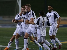 The University of Windsor Lancers celebrate a goal against the Waterloo Warriors at Alumni Field in Windsor on Friday, September 11, 2015. (TYLER BROWNBRIDGE/The Windsor Star)