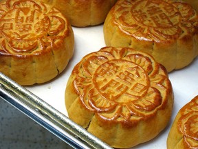 Chinese moon cakes - the traditional golden pastry eaten during the Mid-Autumn Festival - are shown in this Wikimedia Commons image.