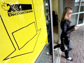 In this file photo, voters leave a polling station at the Humbervale Christian Outreach in Etobicoke, Ontario Monday May 2, 2011 after casting their ballot in Canada's federal election.  (Tim Fraser for National Post)