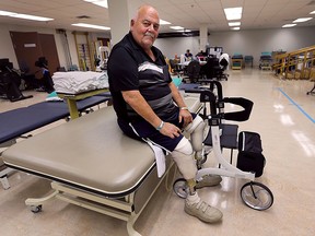Rick Reaume, 70, says the health care system works well for him and he wants new government to keep it that way. He lost both legs and five fingers to complications from diabetes. He is shown during a physiotherapy session on Thursday, Sept. 24, 2015, at the Hotel-Dieu Grace Healthcare facility in Windsor, ON. (DAN JANISSE/The Windsor Star)