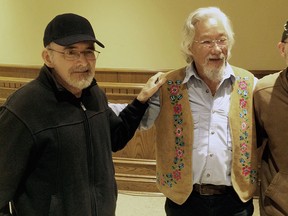 Former Citizens Environment Alliance member Rick Coronado, left, meets environmentalist David Suzuki, with current CEA member Derek Coronado, right. (CHRIS THOMPSON/The Windsor Star)