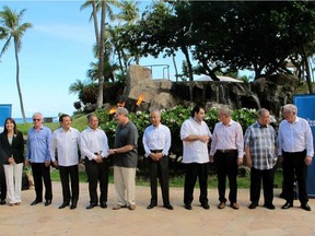 Trade ministers from 12 Pacific Rim nations negotiating the Trans-Pacific Partnership agreement pose for a group photo at a meeting in Lahaina, Hawaii on July 30, 2015. From left, Peru's Minister of Foreign Trade and Tourism Magali Silva, New Zealand's Minister of Trade Tim Groser, Mexico's Secretary of the Economy Ildefonso Guajardo Villarreal, Malaysia's Minister of International Trade and Industry Mustapa Mohamed, U.S. Trade Representative Michael Froman, Japan's Economic and Fiscal Policy Minister Akira Amari, Chile's Director General of International Relations Andres Rebolledo, Canada's Minister of International Trade Ed Fast, Brunei's Second Minister for Foreign Affairs and Trade Lim Jock Seng and Australia's Minister for Trade and Investment Andrew Robb. Negotiations on the massive free-trade proposal will resume in Atlanta, U.S.A. today.