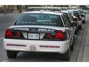 Polizeikreuzer von Windsor werden in der Nähe des Hauptquartiers in der Innenstadt gezeigt.