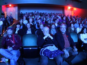 WINDSOR, ONT.: NOVEMBER 8, 2013 -- Moviegoers watch Haute Cuisine on Friday night at the Windsor International Film Festival at the Capitol Theatre, Nov. 8, 2013. (DAX MELMER/The Windsor Star)