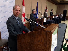 The Windsor Star's Craig Pearson leads the Windsor-Essex Regional Chamber of Commerce federal election debate at the Caboto Club in Windsor on Wednesday, September 30, 2015.