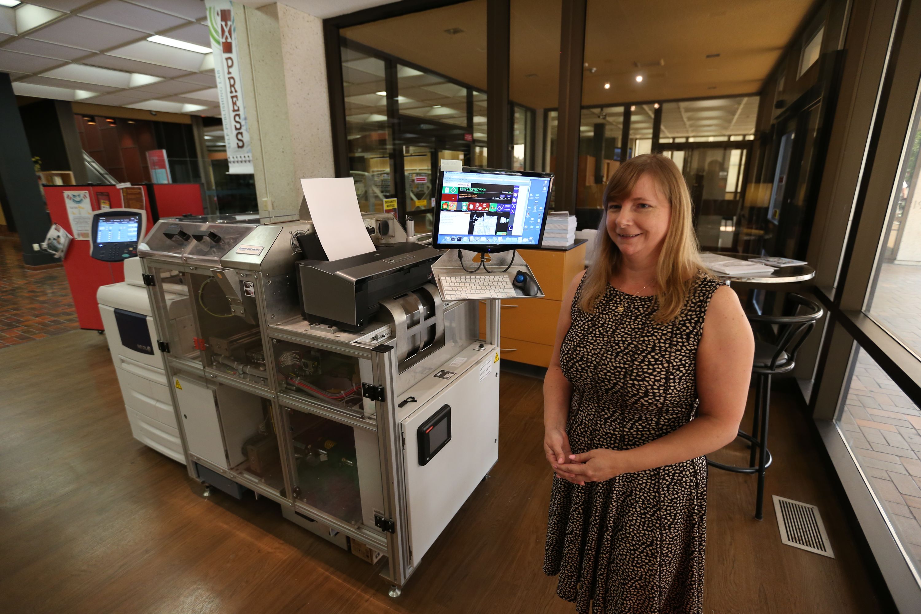 Fewer Books More Digital 7 9 Million Helps Create New Library System