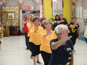 Participants at Fung Loy Kok Taoist Tai Chi go through a series of 108 moves during a recent session at the club. (JASON KRYK / The Windsor Star)