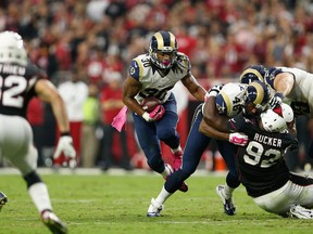 Running back Todd Gurley #30 of the St. Louis Rams runs up field during the third quarter of the NFL game against the Arizona Cardinals at the University of Phoenix Stadium on October 4, 2015 in Glendale, Arizona.  (Photo by Christian Petersen/Getty Images)