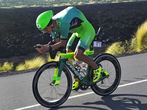 Lionel Sanders rides during the cycling portion of the Ironman World Championship Triathlon, Saturday, Oct. 10, 2015, in Kailua-Kona, Hawaii. (AP Photo/Mark J. Terrill)
