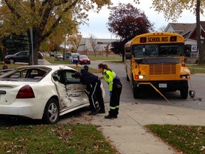 All students were safe following a collision between a Pontiac and a school bus at the intersection of Reginald Street and Bernard Road in Windsor on Oct. 27, 2015.