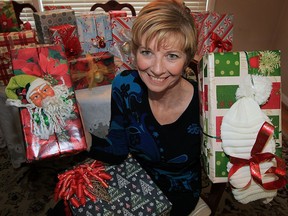 Brenda Brunelle and her friends held an early Christmas party and wrapped 30 shoe boxes with gifts inside for Hiatus House families Wednesday October 21, 2015.  Brunelle is hoping area residents will get into the holiday spirit by dropping off their own gifts at Hiatus House on Louis Avenue.
