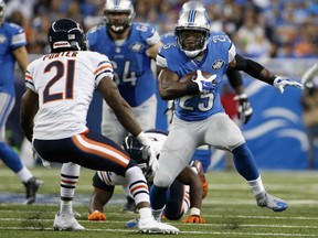 Theo Riddick #25 of the Detroit Lions runs for yards in the first half while playing the Chicago Bears at Ford Field on October 18, 2015 in Detroit, Michigan. The Detroit Lions won 37-34 in over time over the Chicago Bears. (Photo by Christian Petersen/Getty Images)