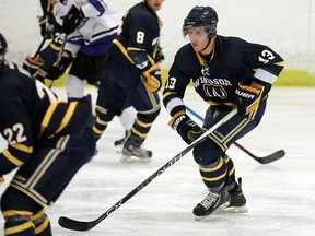 The University of Windsor Lancers Justice Dundas plays against the University of Ontario Institute of Technology Ridgebacks at South Windsor Arena in Windsor on Friday, October 23, 2015.                                      (TYLER BROWNBRIDGE/The Windsor Star)