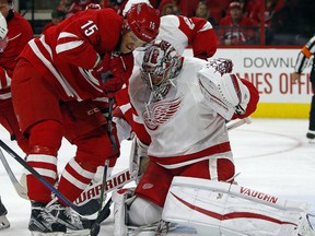 Carolina Hurricanes' Andrej Nestrasil (15) of Czech Republic, has his shot blocked by Detroit Red Wings goalie Petr Mrazek (34) of Czech Republic, during the second period of an NHL hockey game, Saturday, Oct. 10, 2015, in Raleigh, N.C. (AP Photo/Karl B DeBlaker)