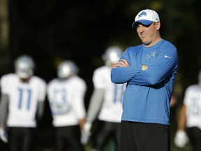 The Detroit Lions' new offensive coordinator  Jim Bob Cooter watches drills during a training session at the Grove Hotel in Chandler's Cross, England, Wednesday, Oct. 28, 2015.  The Detroit Lions are due to play the Kansas City Chiefs at Wembley stadium in London on Sunday in a regular season NFL game.  (AP Photo/Matt Dunham)