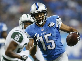 Detroit Lions wide receiver Golden Tate pulls ahead of New York Jets defensive back Marcus Gilchrist for a touchdown during the first half of an NFL preseason football game, Thursday, Aug. 13, 2015, in Detroit. (AP Photo/Rick Osentoski)