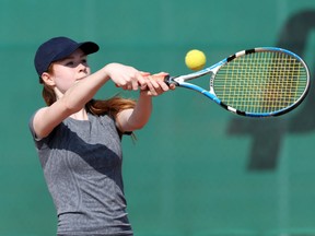 Haliegh Mitchell from Walkerville returns a shot during WECSSAA tennis playdowns  held at Parkside Tennis Club in Windsor, Ontario on October 8, 2010. (JASON KRYK/The Windsor Star)