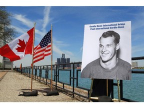 A photograph of Gordie Howe is displayed on the riverfront after a news conference on May 14, 2015, announcing a planned bridge connecting Detroit and Windsor, will be named after the hockey Hall of Famer. (Dave Chidley/The Canadian Press)